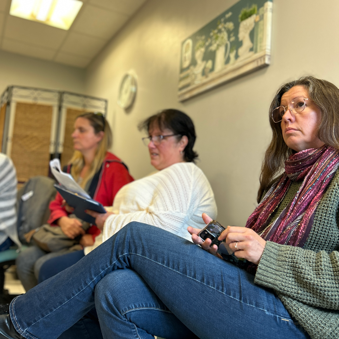 Three women at a mental health support group